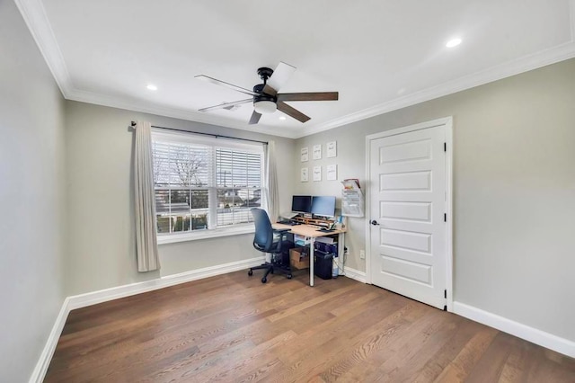 office space featuring hardwood / wood-style flooring, ceiling fan, and ornamental molding