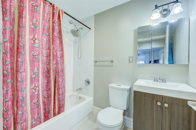 full bathroom featuring tile patterned floors, vanity, toilet, and shower / bath combo with shower curtain