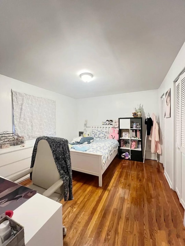 bedroom featuring hardwood / wood-style floors