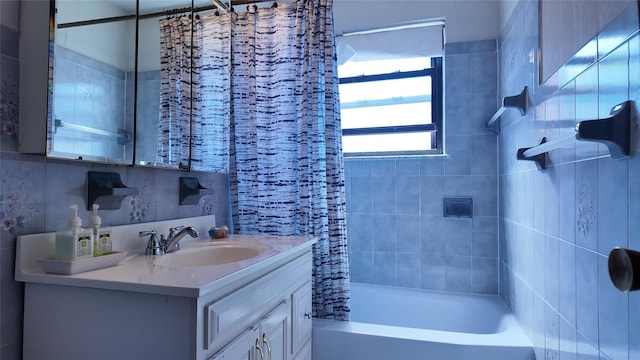 bathroom with shower / bath combo and vanity