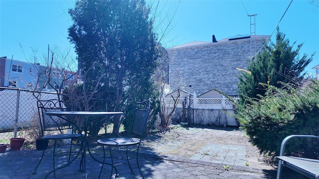 view of patio with fence
