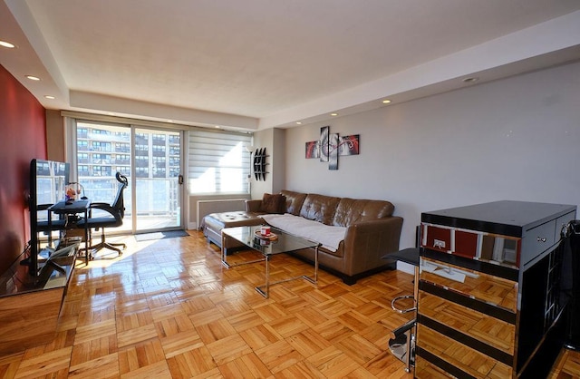 living room with light parquet floors