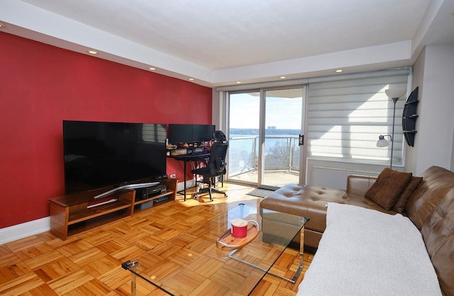 living room featuring light parquet flooring