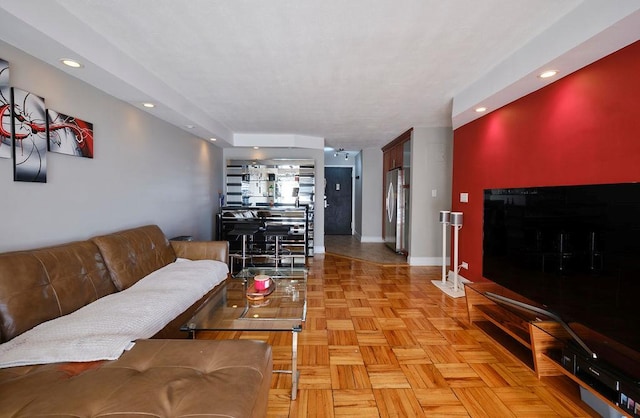 living room featuring light parquet floors