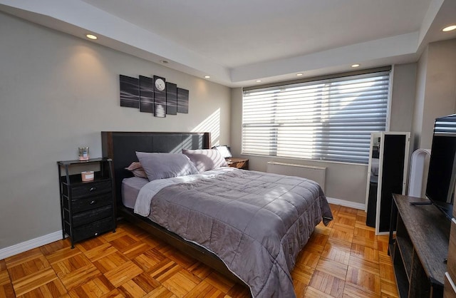 bedroom with parquet floors