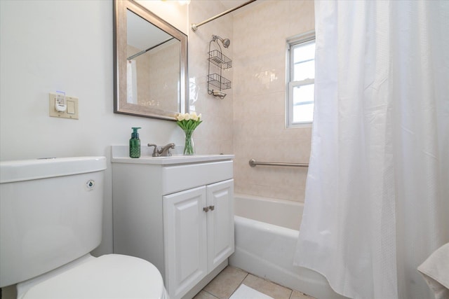 full bathroom featuring toilet, tile patterned floors, vanity, and shower / tub combo with curtain