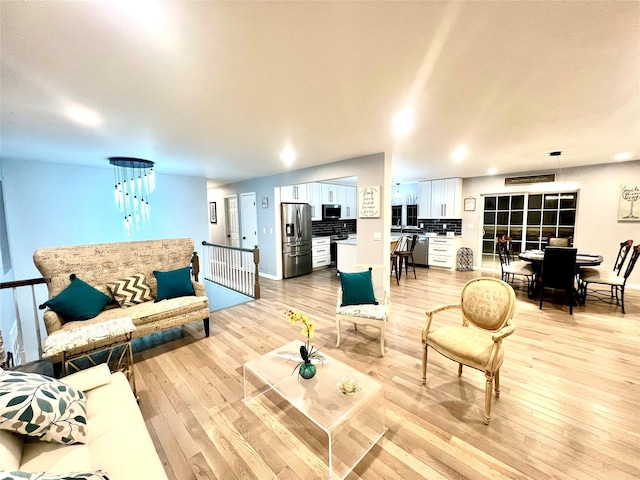 living room featuring light wood-type flooring