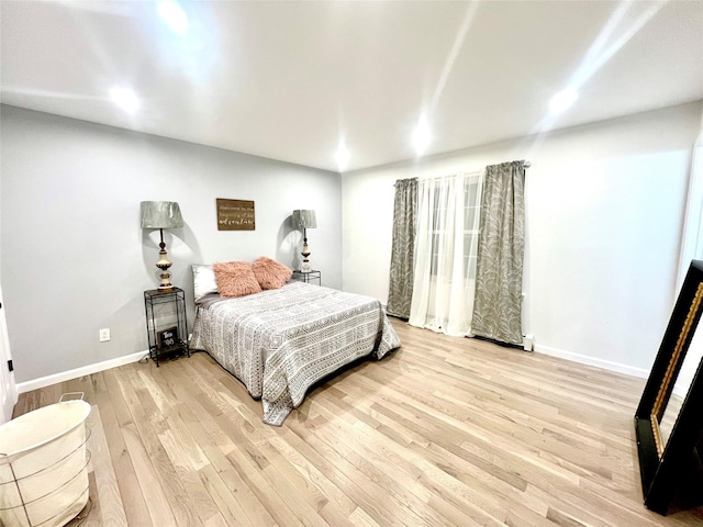 bedroom featuring light hardwood / wood-style floors