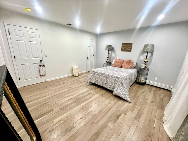 bedroom featuring hardwood / wood-style flooring