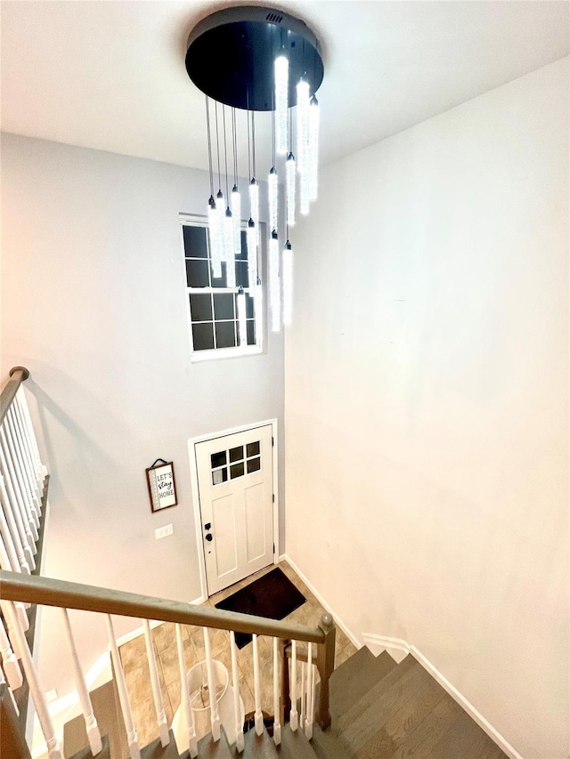 stairway featuring hardwood / wood-style floors