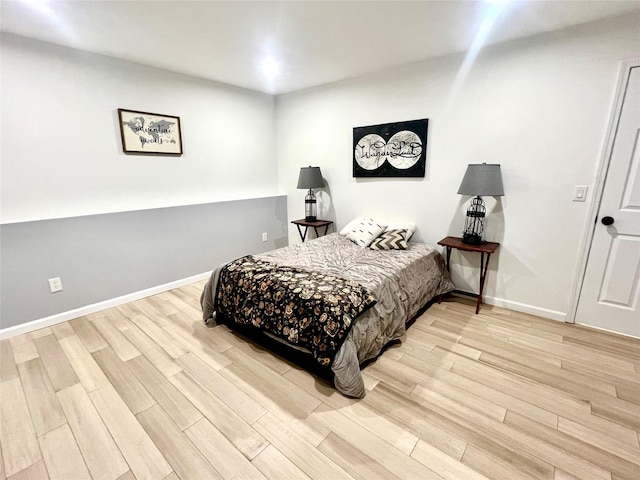 bedroom featuring light wood-type flooring