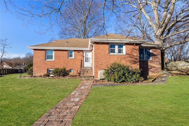 view of front of home with a front yard