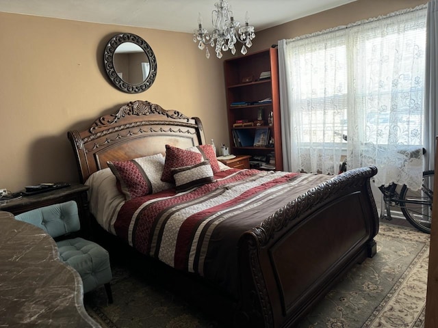 bedroom with a chandelier