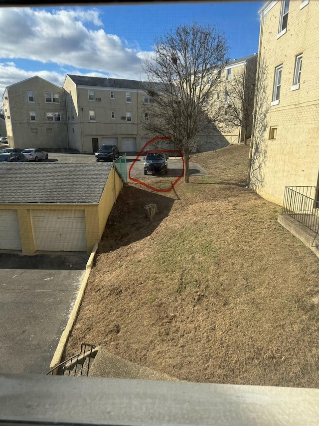 view of yard with a garage