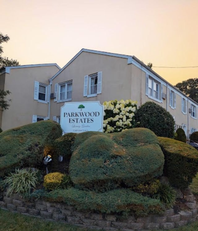 view of property exterior at dusk