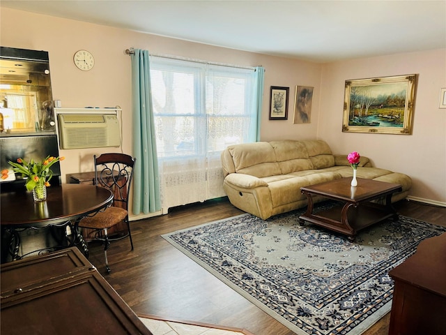71-04 Little Neck Pkwy Unit 134A, Bellerose, NY 11426 - living area with wood finished floors and a wall mounted air conditioner