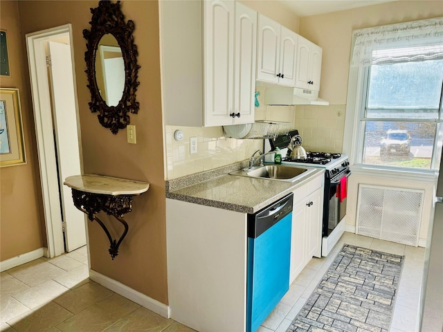 71-04 Little Neck Pkwy Unit 134A, Bellerose, NY 11426 - kitchen featuring dishwashing machine, a sink, gas range oven, decorative backsplash, and white cabinetry