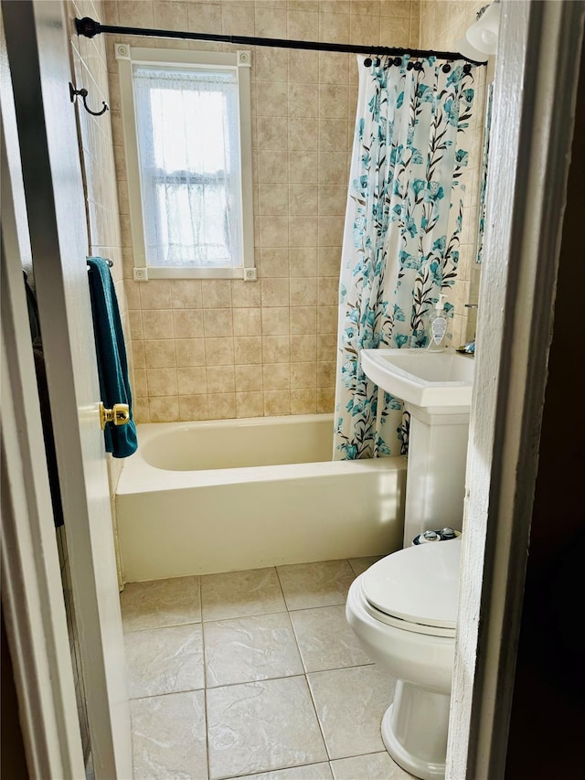 71-04 Little Neck Pkwy Unit 134A, Bellerose, NY 11426 - bathroom with toilet, tile patterned floors, and shower / bathtub combination with curtain