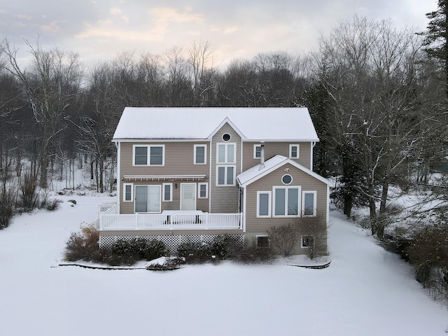 view of front of home with a wooden deck