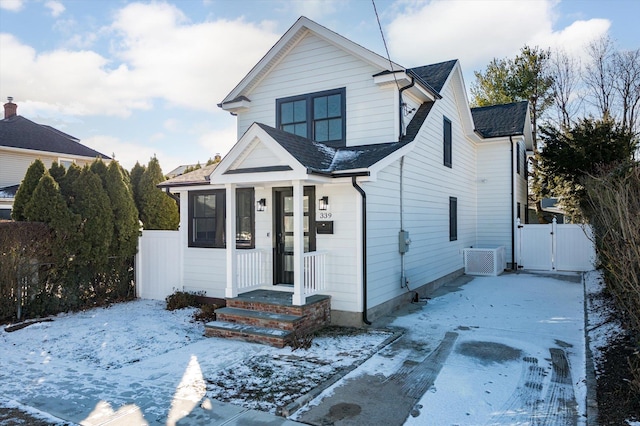 view of front of house with central AC unit