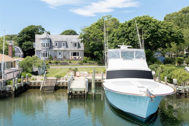 dock area with a water view