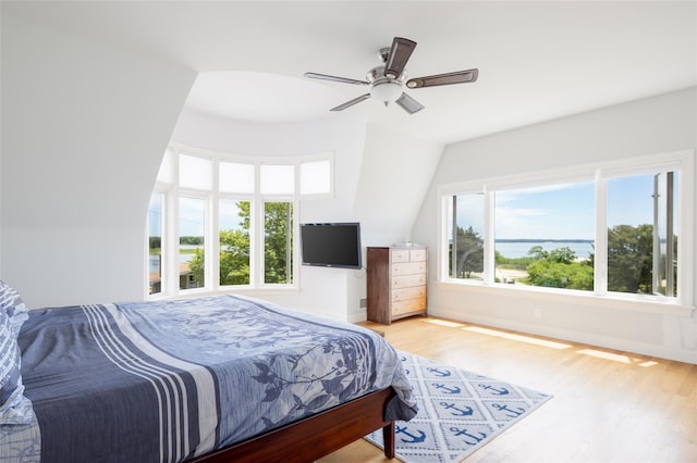 bedroom featuring ceiling fan and light hardwood / wood-style flooring