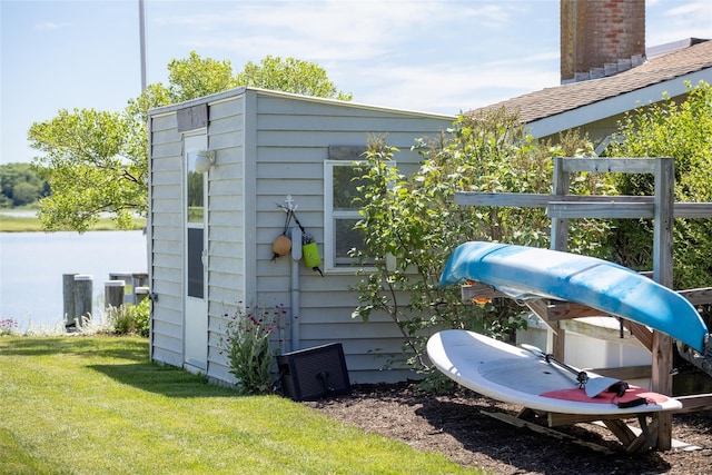 view of outdoor structure featuring a yard