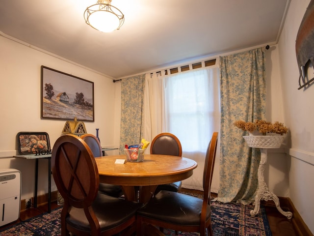 dining room with ornamental molding