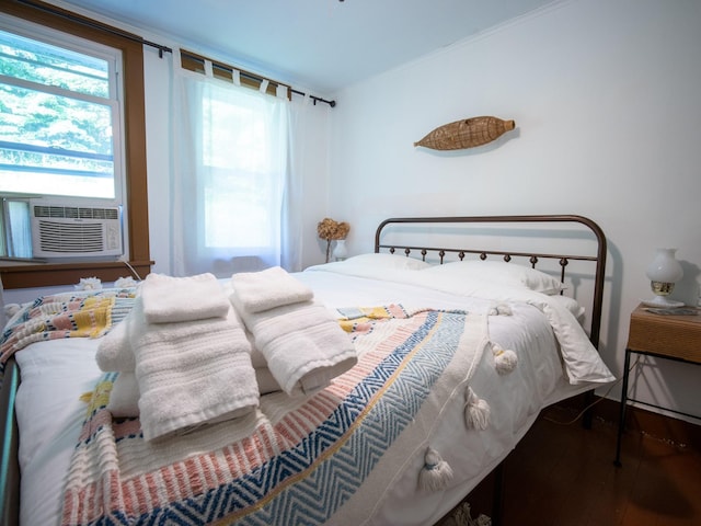 bedroom featuring dark wood-type flooring