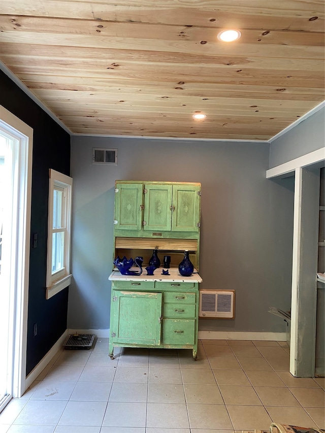 bathroom featuring tile patterned flooring, wood ceiling, and crown molding