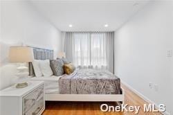 bedroom featuring light hardwood / wood-style floors