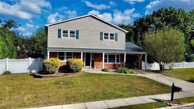 view of front facade with a porch and a front yard