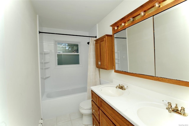 full bathroom featuring tile patterned floors, vanity, toilet, and shower / bath combo with shower curtain