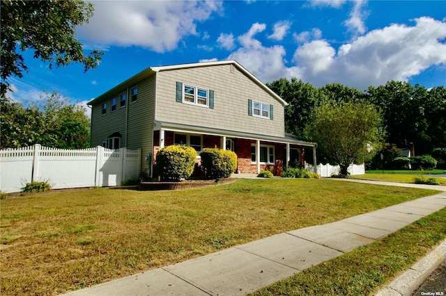 view of front facade with a front yard