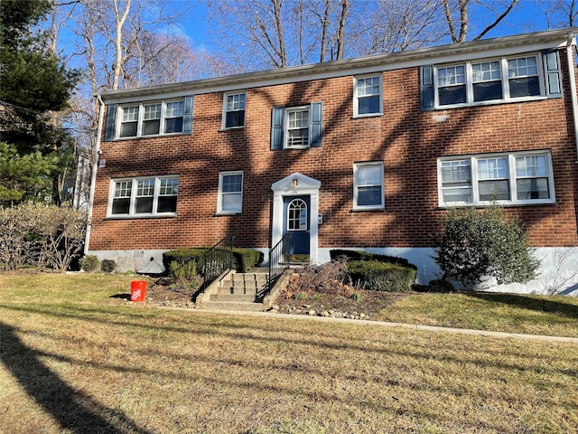 view of front of property with a front yard