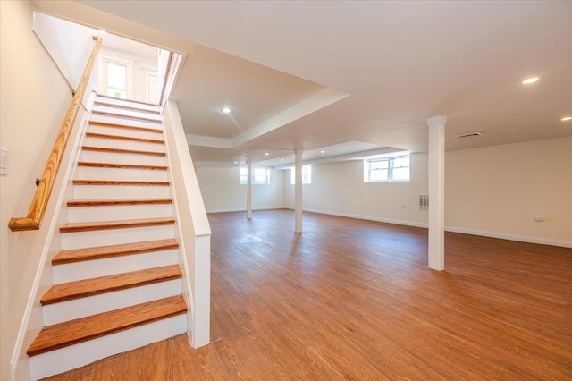 basement featuring light hardwood / wood-style flooring