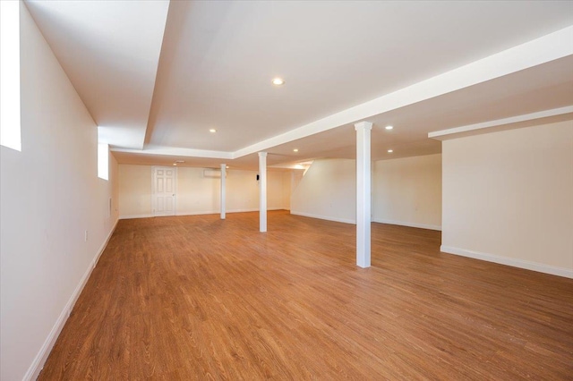 basement featuring wood-type flooring