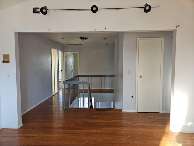 empty room with hardwood / wood-style flooring