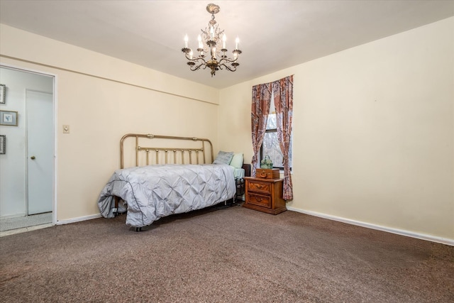 carpeted bedroom with a chandelier