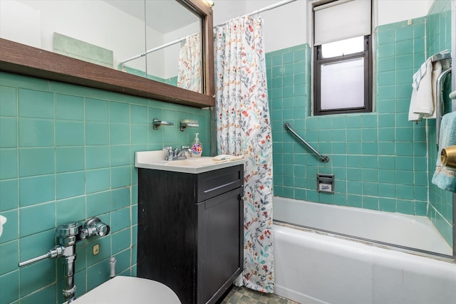 bathroom featuring vanity, decorative backsplash, shower / bathtub combination with curtain, and tile walls