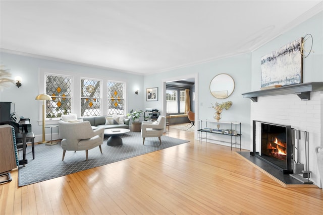 living room featuring crown molding and light wood-type flooring