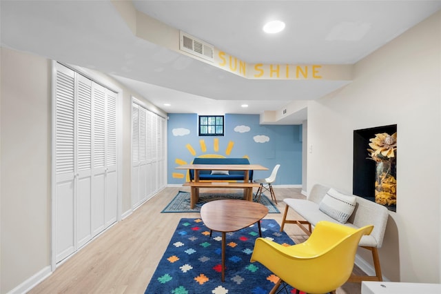 playroom with light wood-type flooring