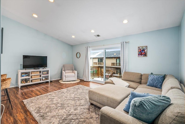 living room featuring dark hardwood / wood-style flooring