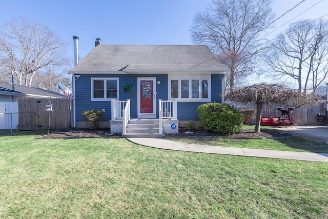 bungalow-style home with a front lawn