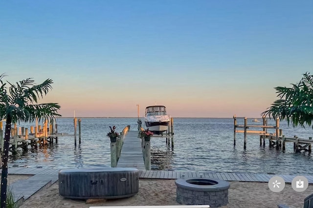 dock area featuring a water view