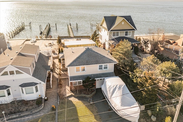 drone / aerial view with a water view