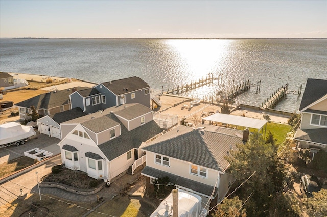 aerial view at dusk with a water view