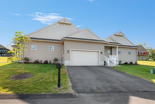 view of front facade featuring a garage and a front yard