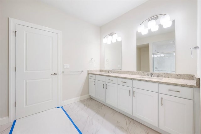 bathroom with vanity and walk in shower