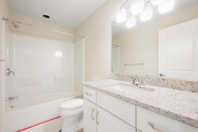 full bathroom with shower / bathing tub combination, vanity, and toilet